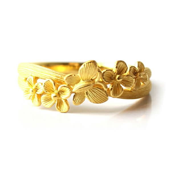 White lily flower and faceted stone adjustable gold-plated ring