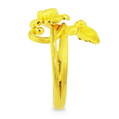 オリエンタル調の花と個性的なリーフ 純金リング