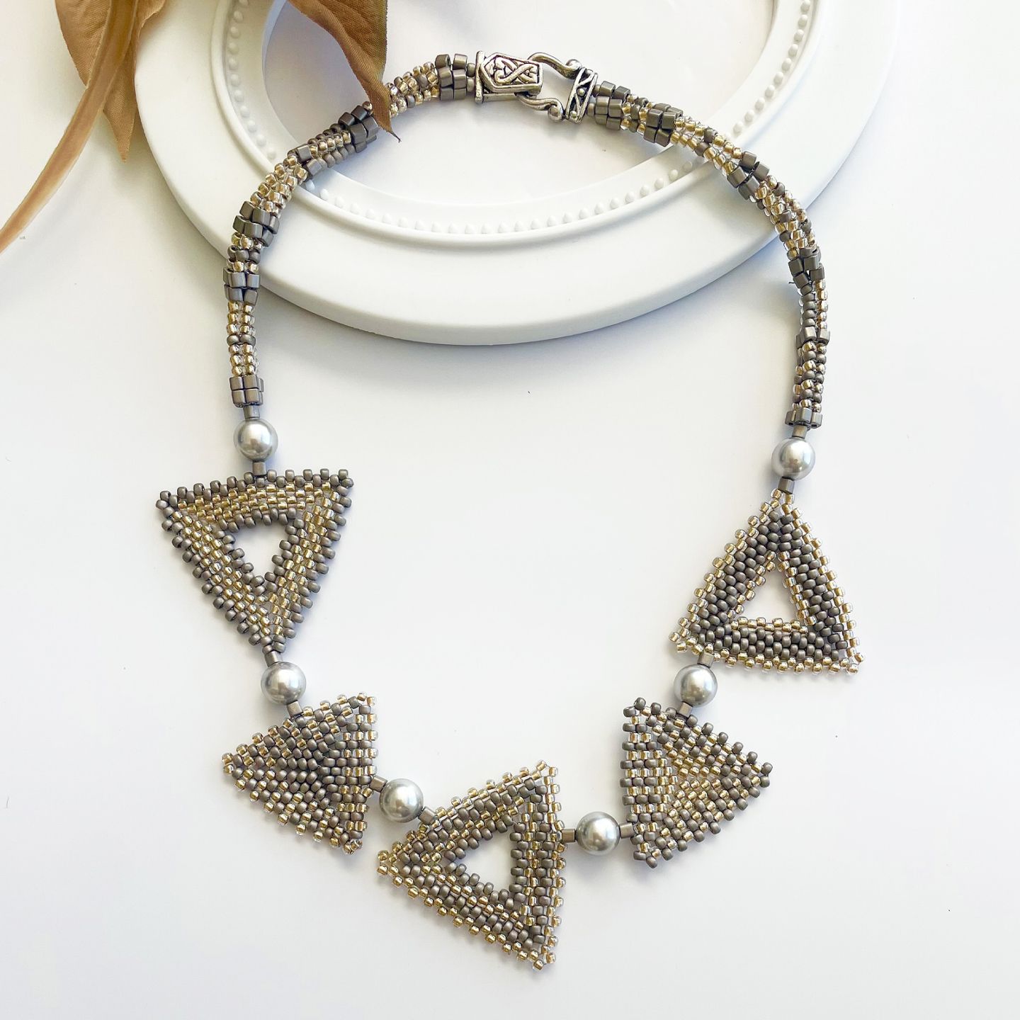 トリアンゴロ パズルネックレス/エレガント