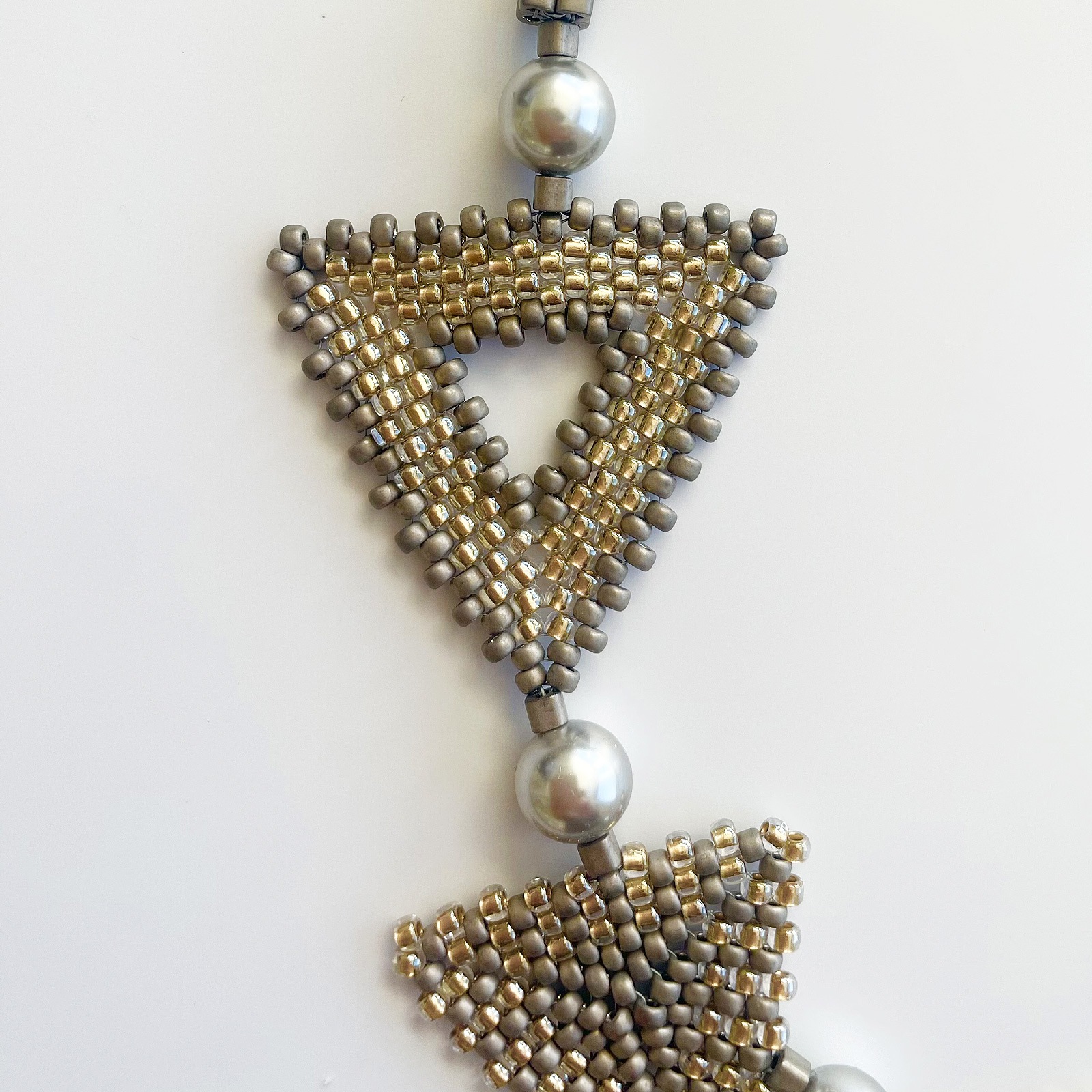 トリアンゴロ パズルネックレス／エレガント