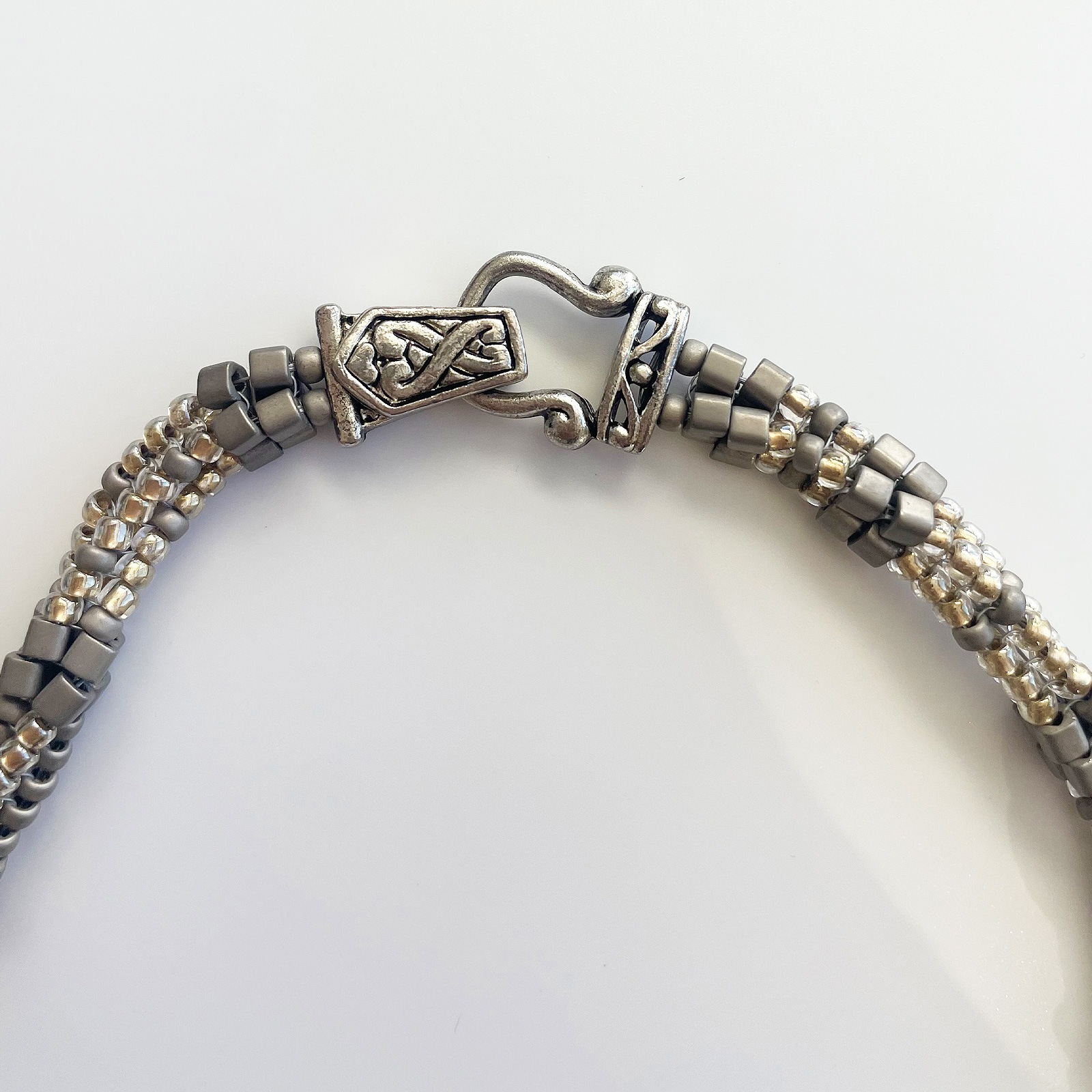 トリアンゴロ パズルネックレス／エレガント