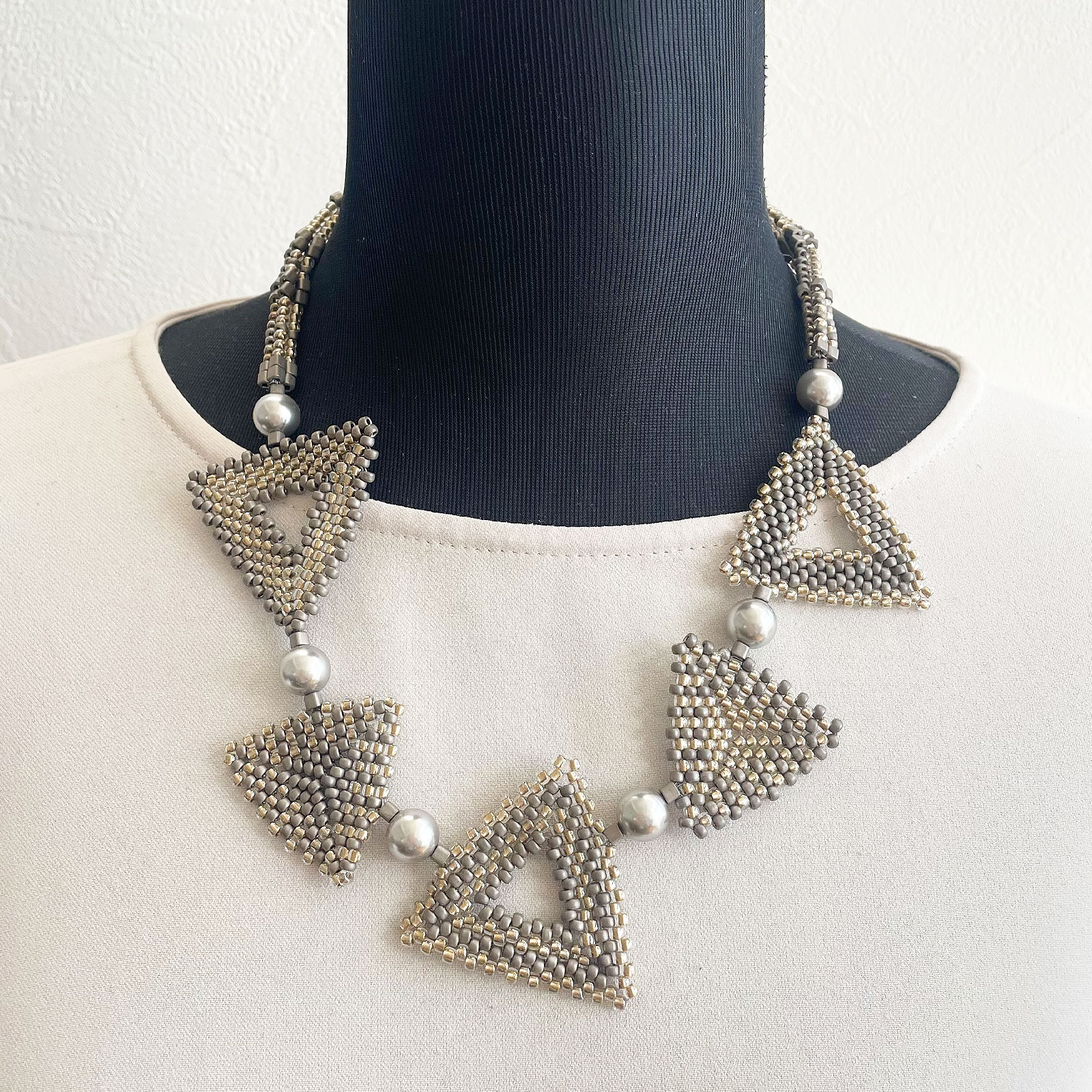 トリアンゴロ パズルネックレス／エレガント