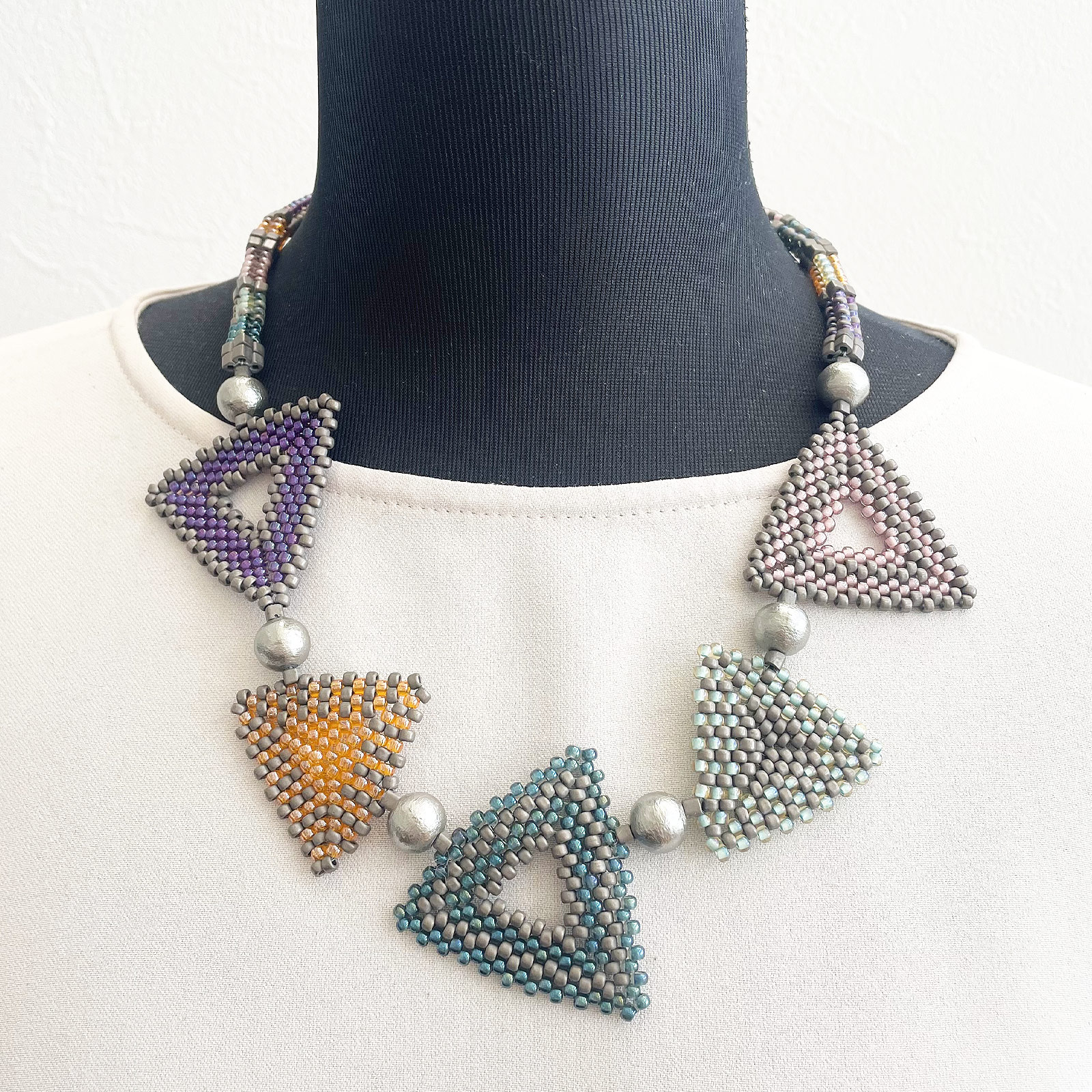 トリアンゴロ パズルネックレス／パステル