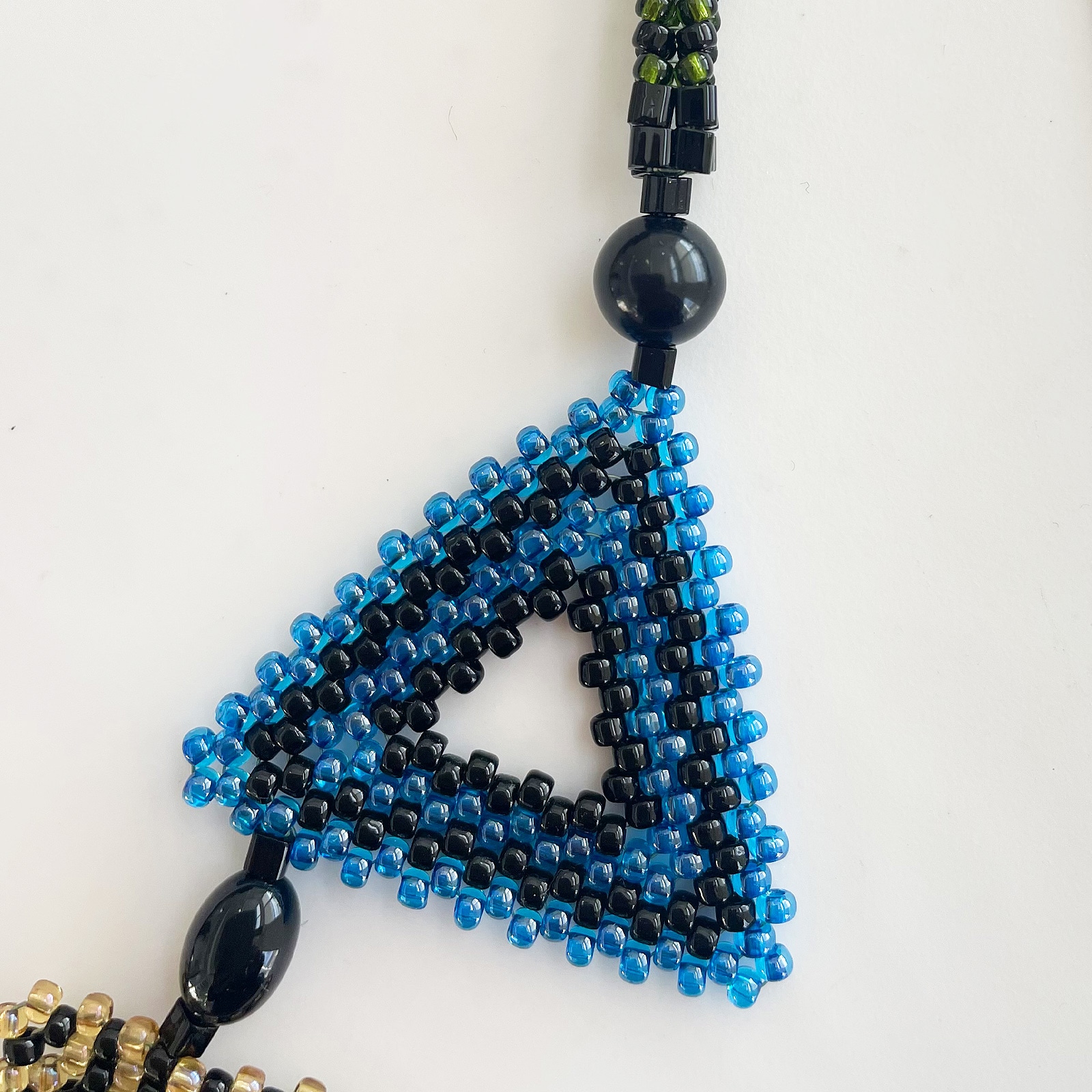 トリアンゴロ パズルネックレス/ステンド