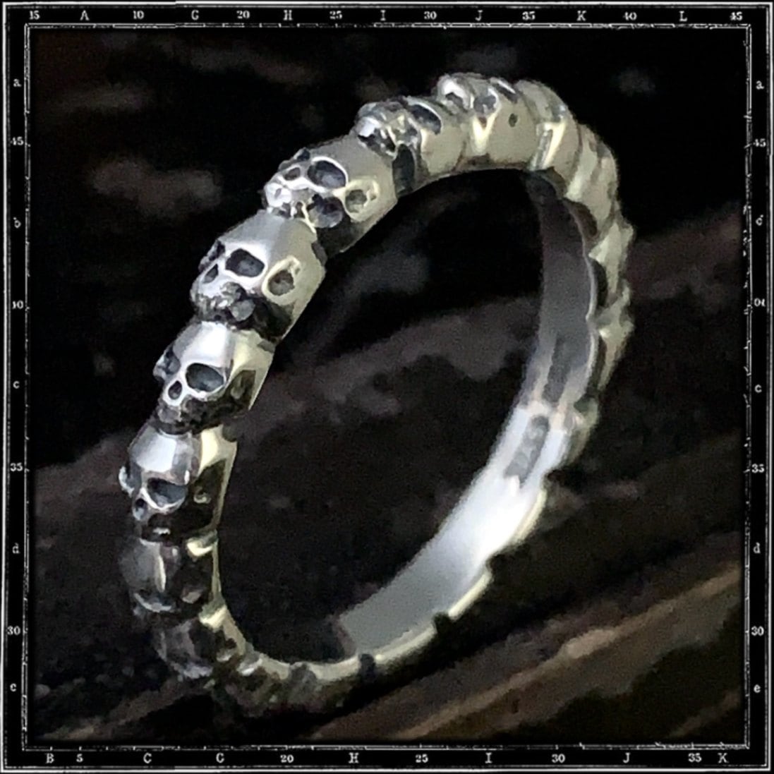 ETERNITY BAND OF SKULLS RING