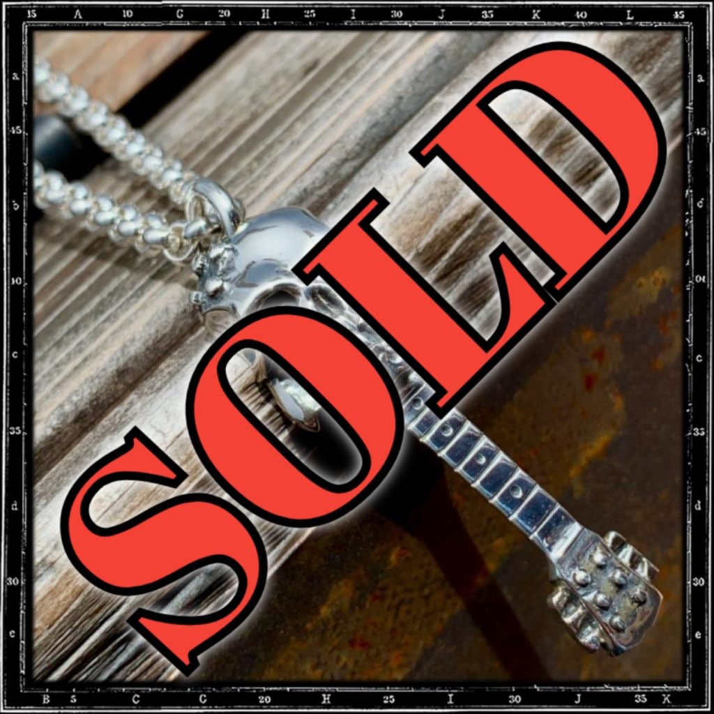 SKULL GUITAR PENDANT