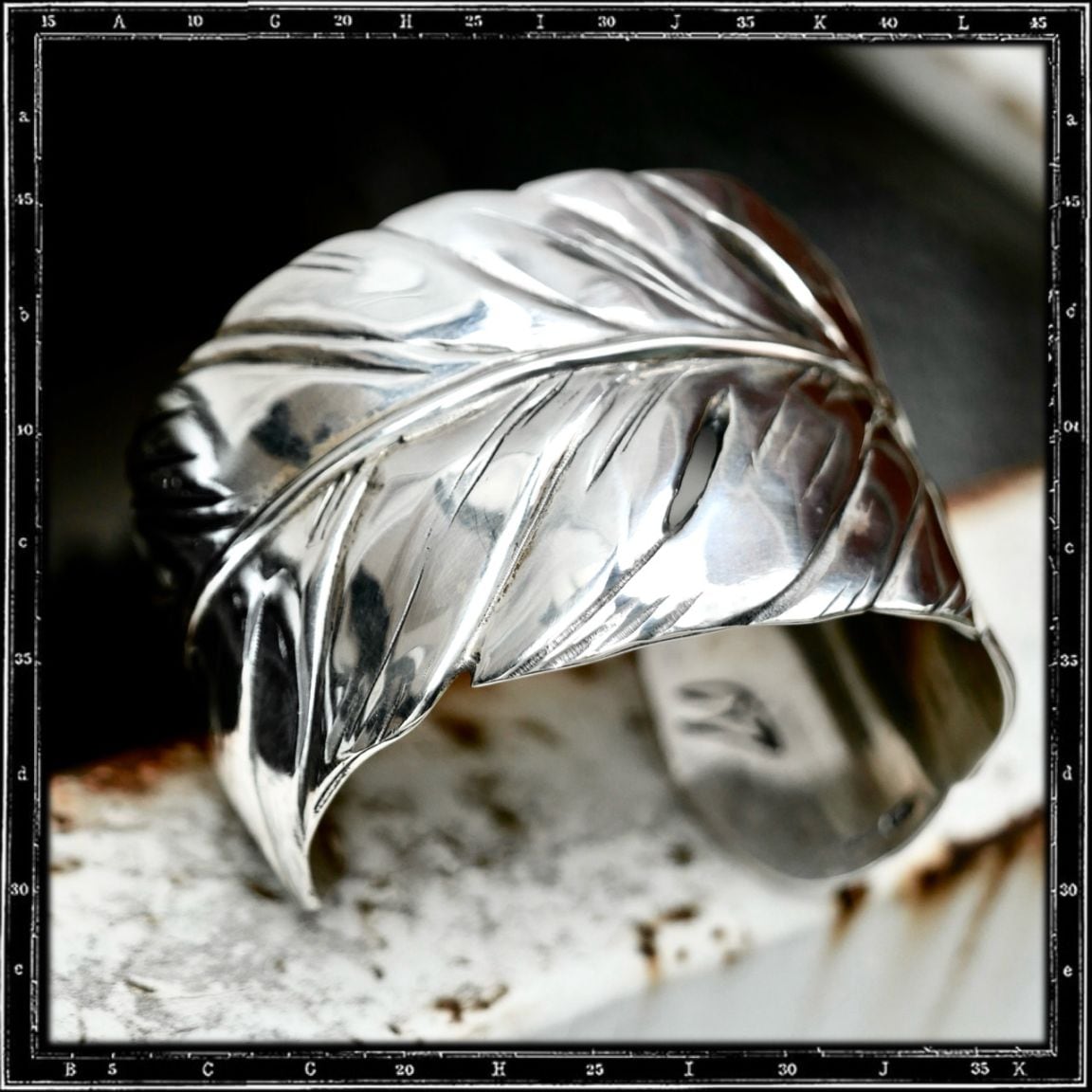 FEATHER BANGLE BRACELET