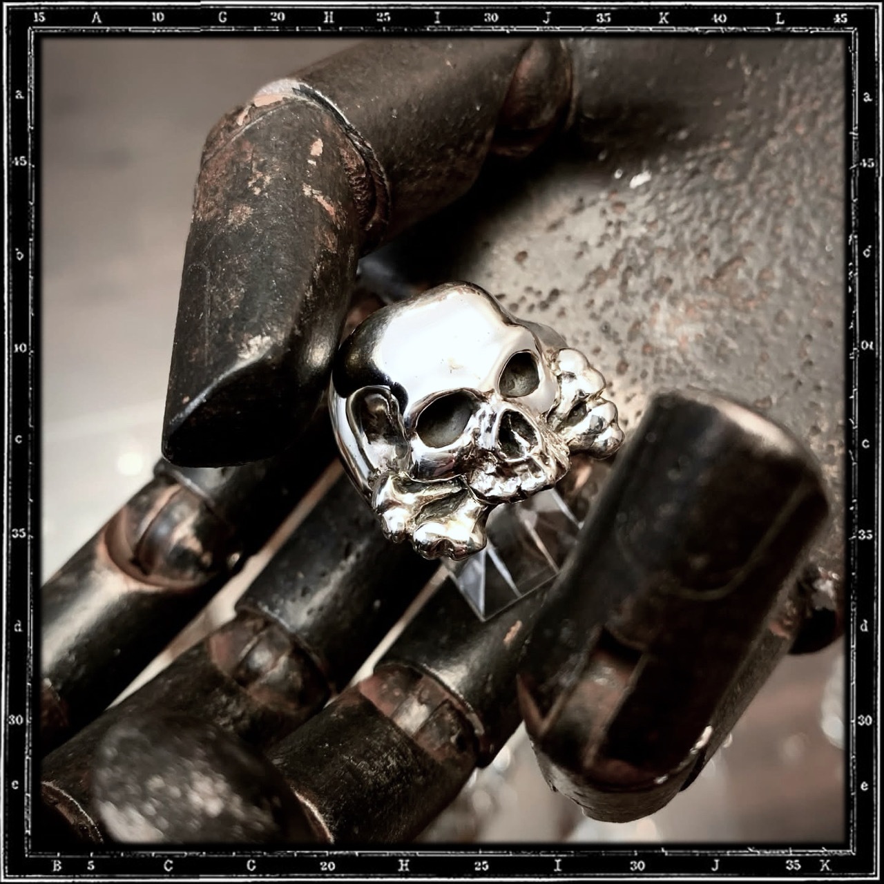THREE QUARTER SKULL & CROSSBONES RING
