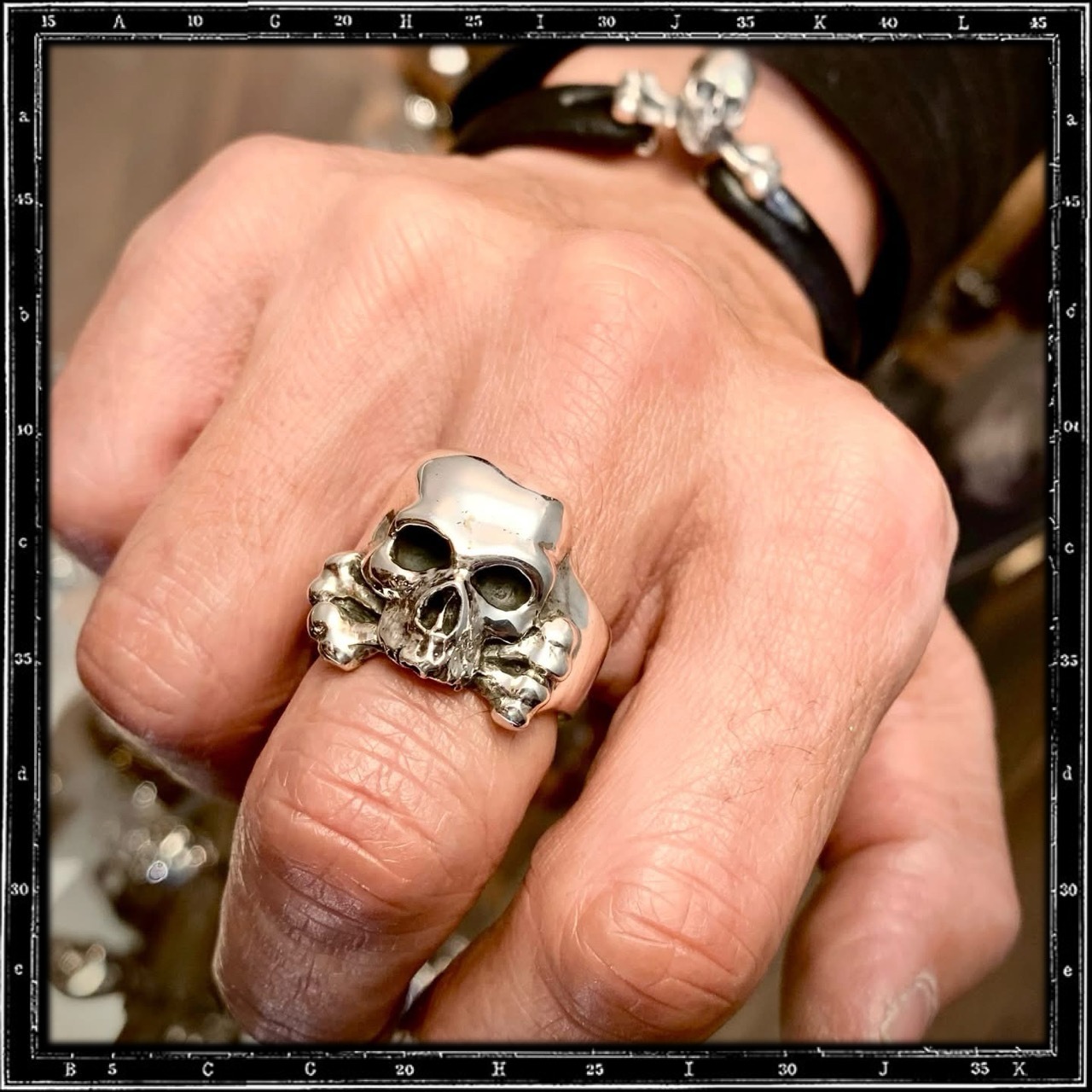 THREE QUARTER SKULL & CROSSBONES RING