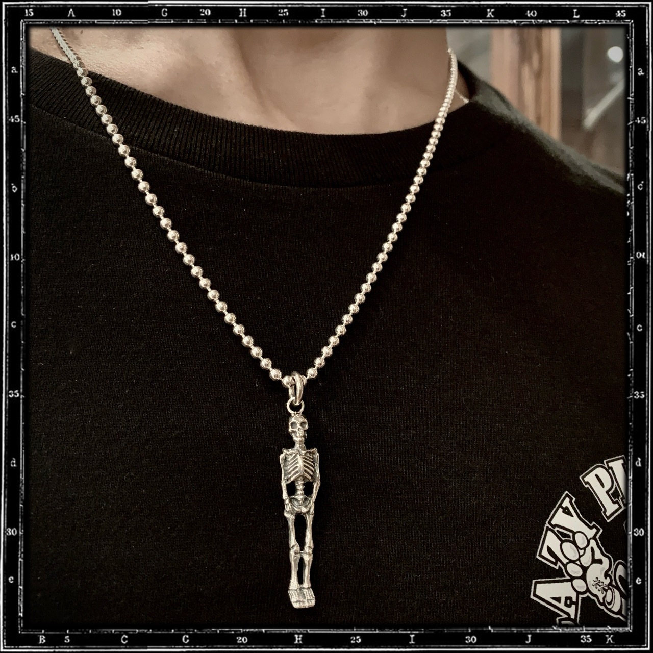 TINY SKELETON PENDANT