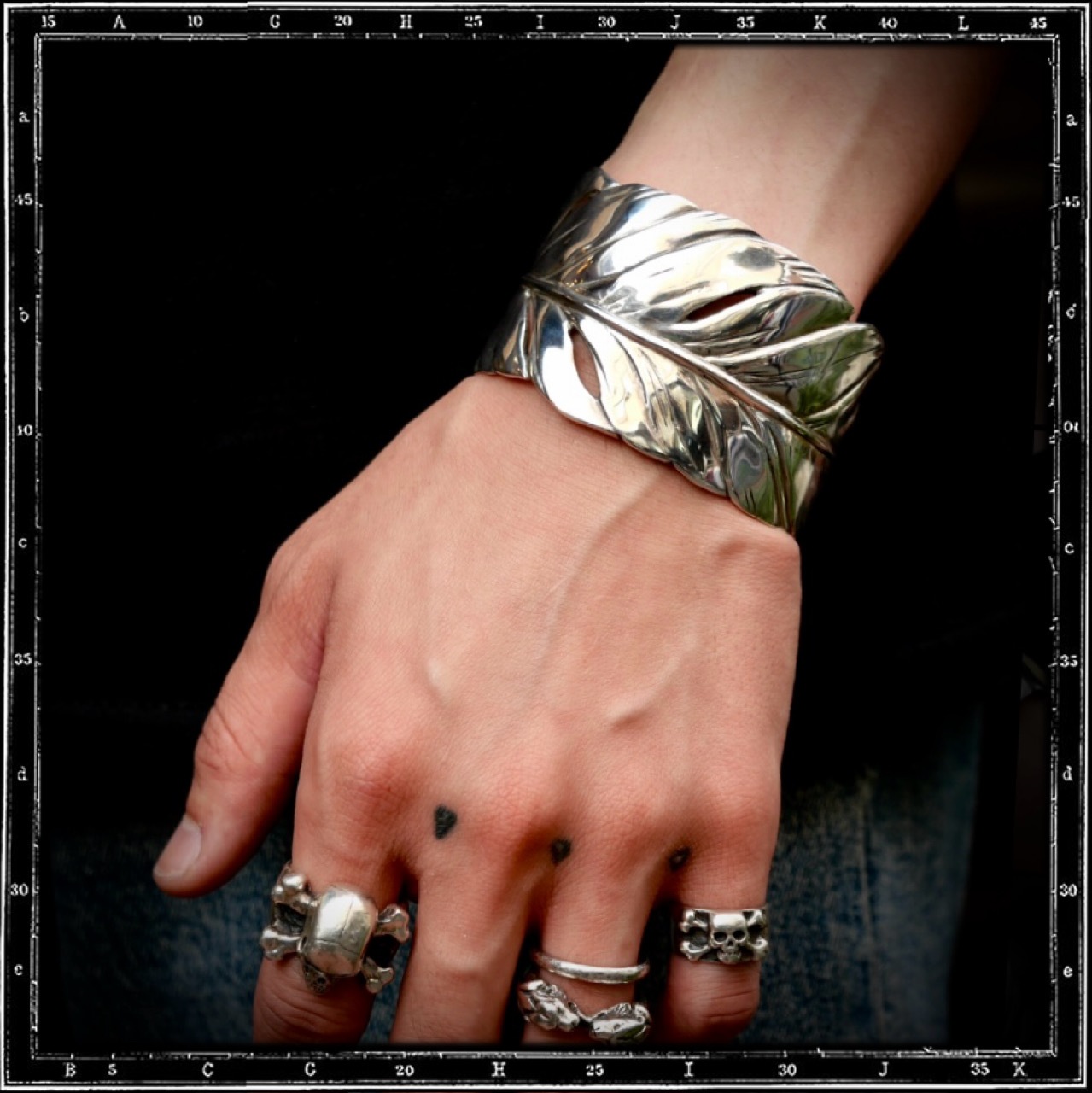 FEATHER BANGLE BRACELET