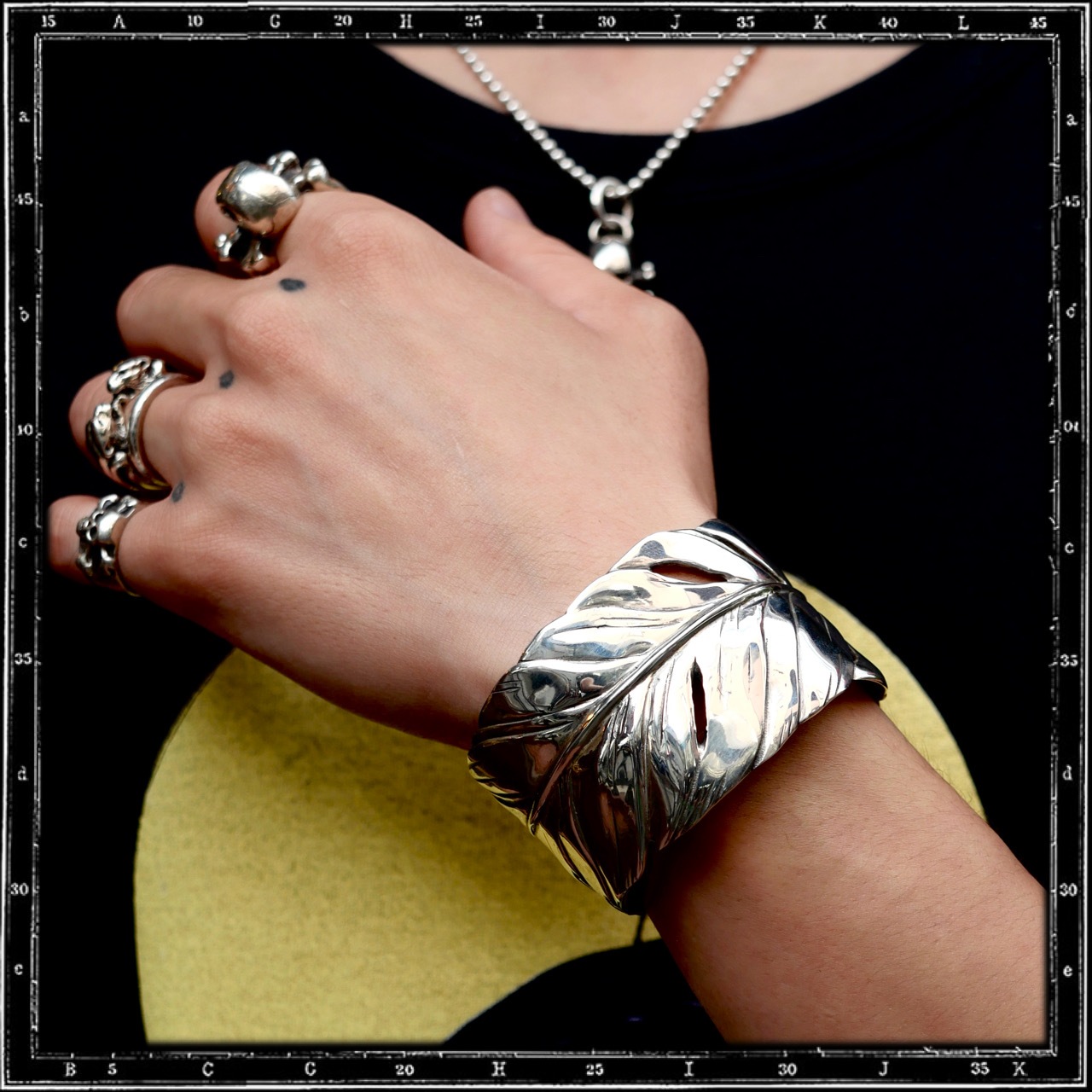 FEATHER BANGLE BRACELET