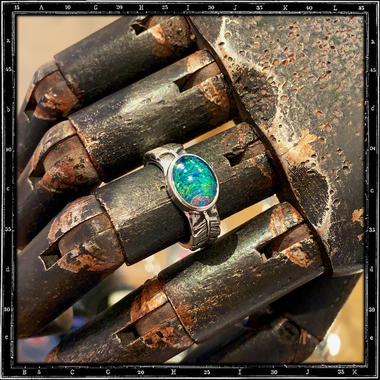 TWO FEATHERS STONE RING