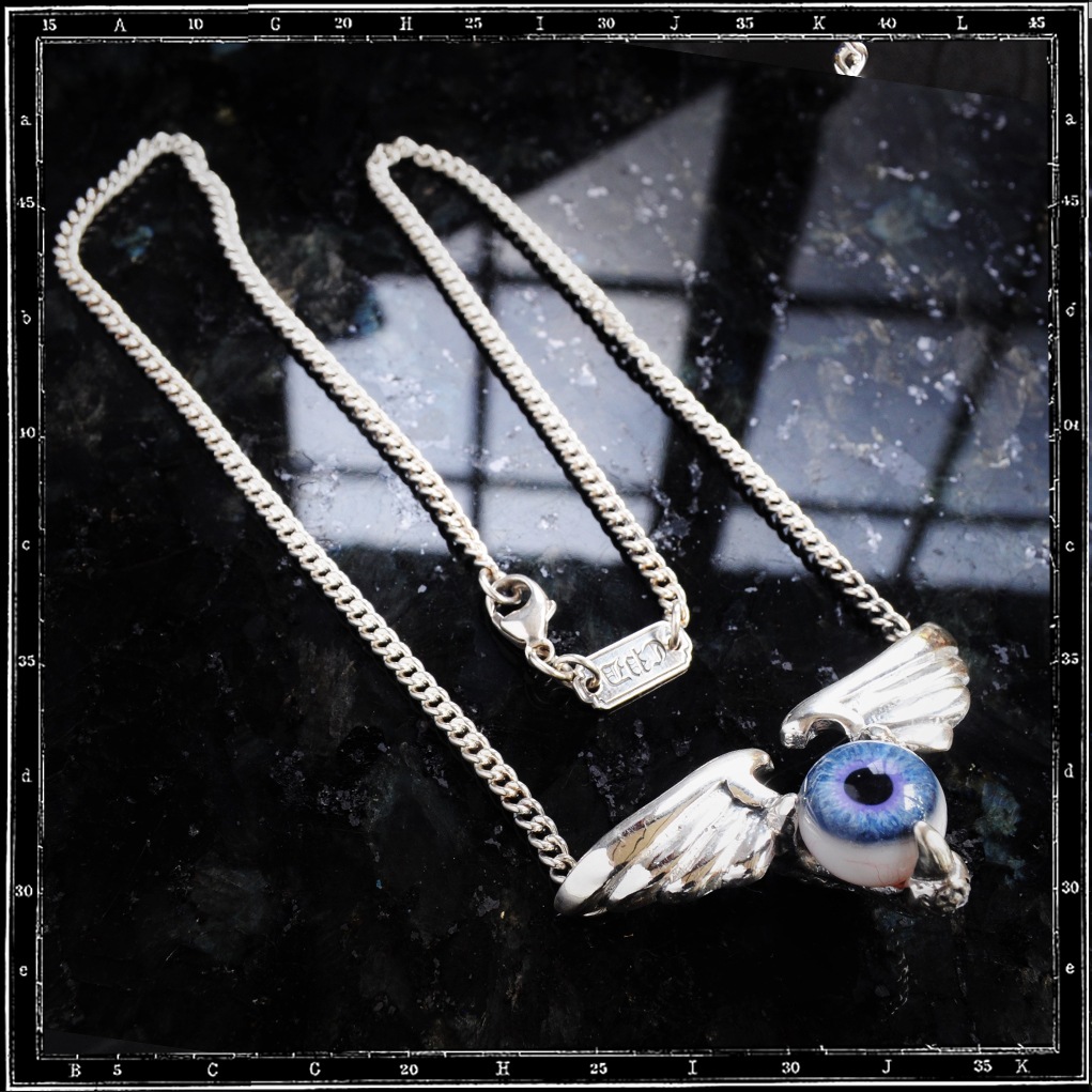 WINGED BALL EYE NECKLACE