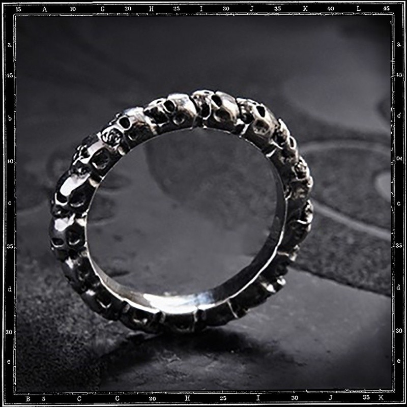 ETERNITY BAND OF SKULLS RING