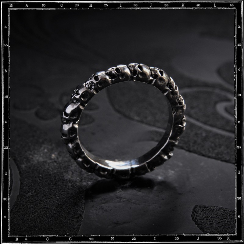 ETERNITY BAND OF SKULLS RING
