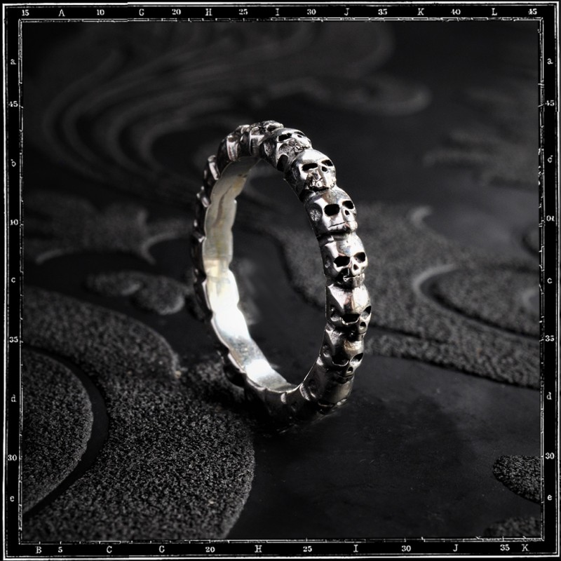 ETERNITY BAND OF SKULLS RING