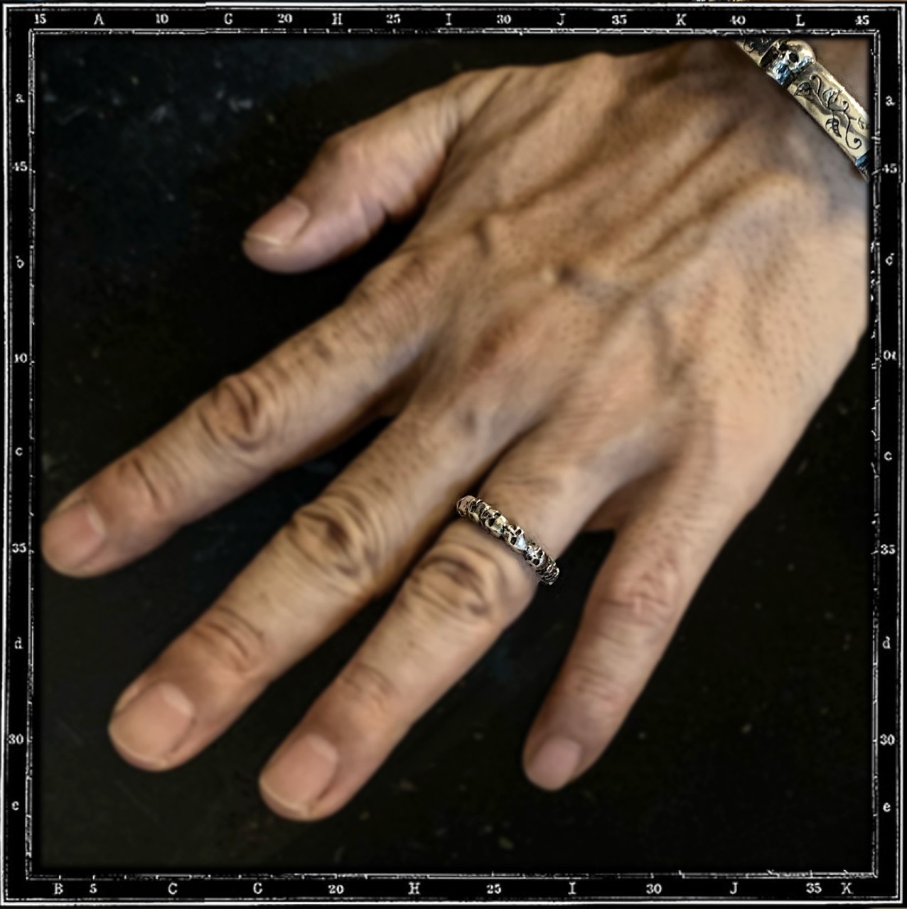 ETERNITY BAND OF SKULLS RING