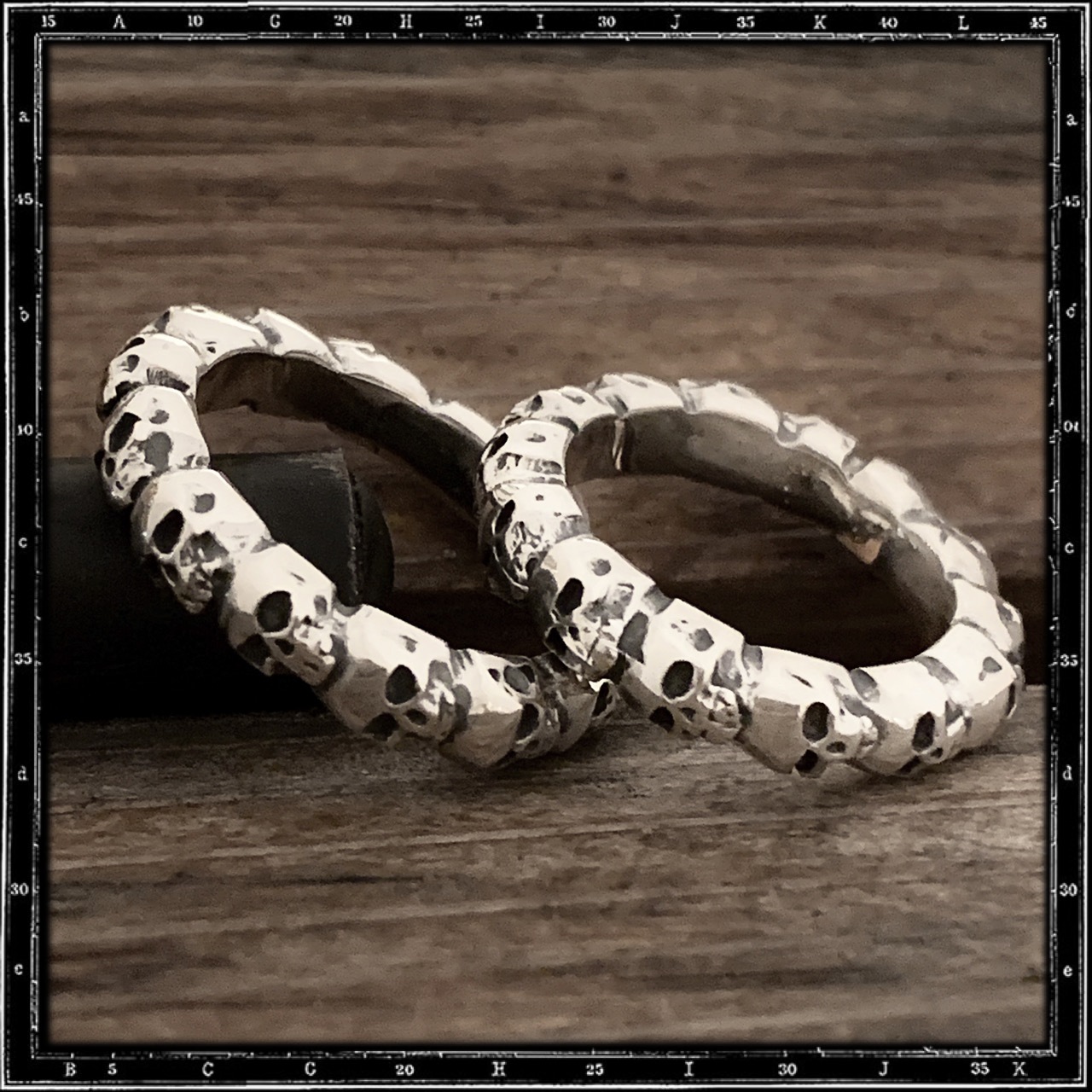 ETERNITY BAND OF SKULLS RING