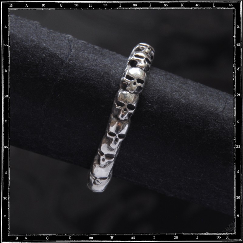 ETERNITY BAND OF SKULLS RING