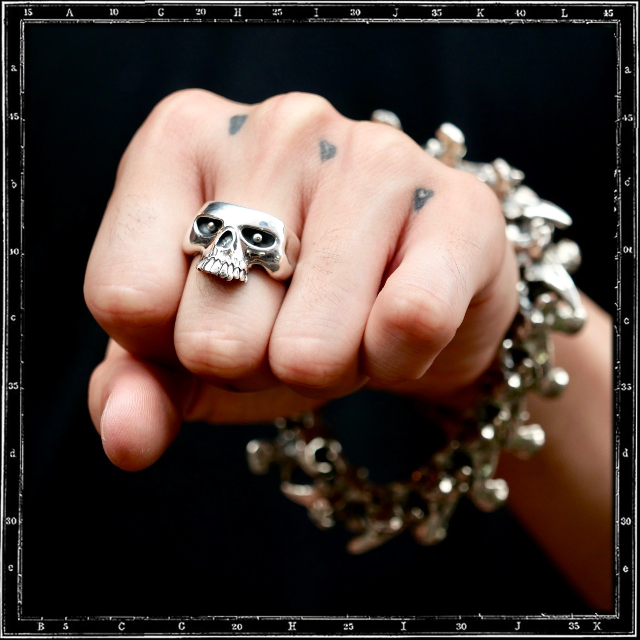 CHOPPED EVIL SKULL RING