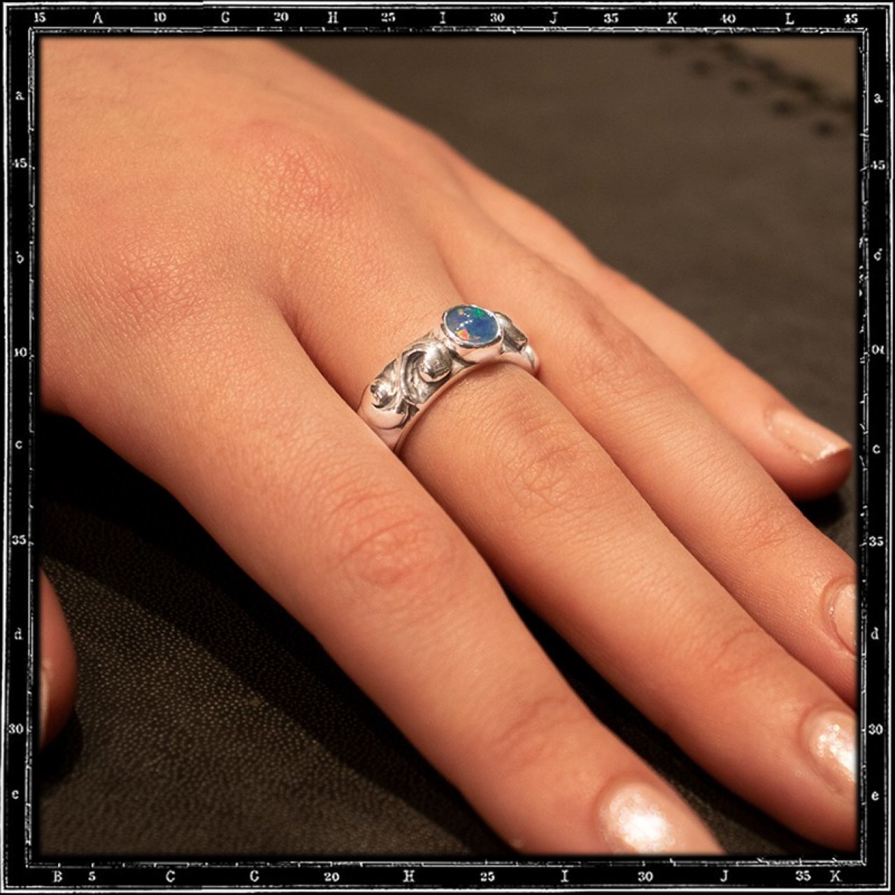 TWO SCROLLS STONE RING