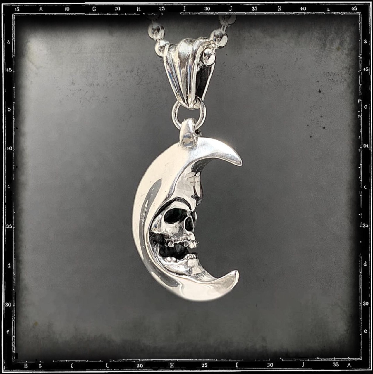 SKULL IN THE MOON PENDANT