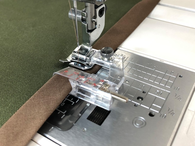 テープガイド押さえ