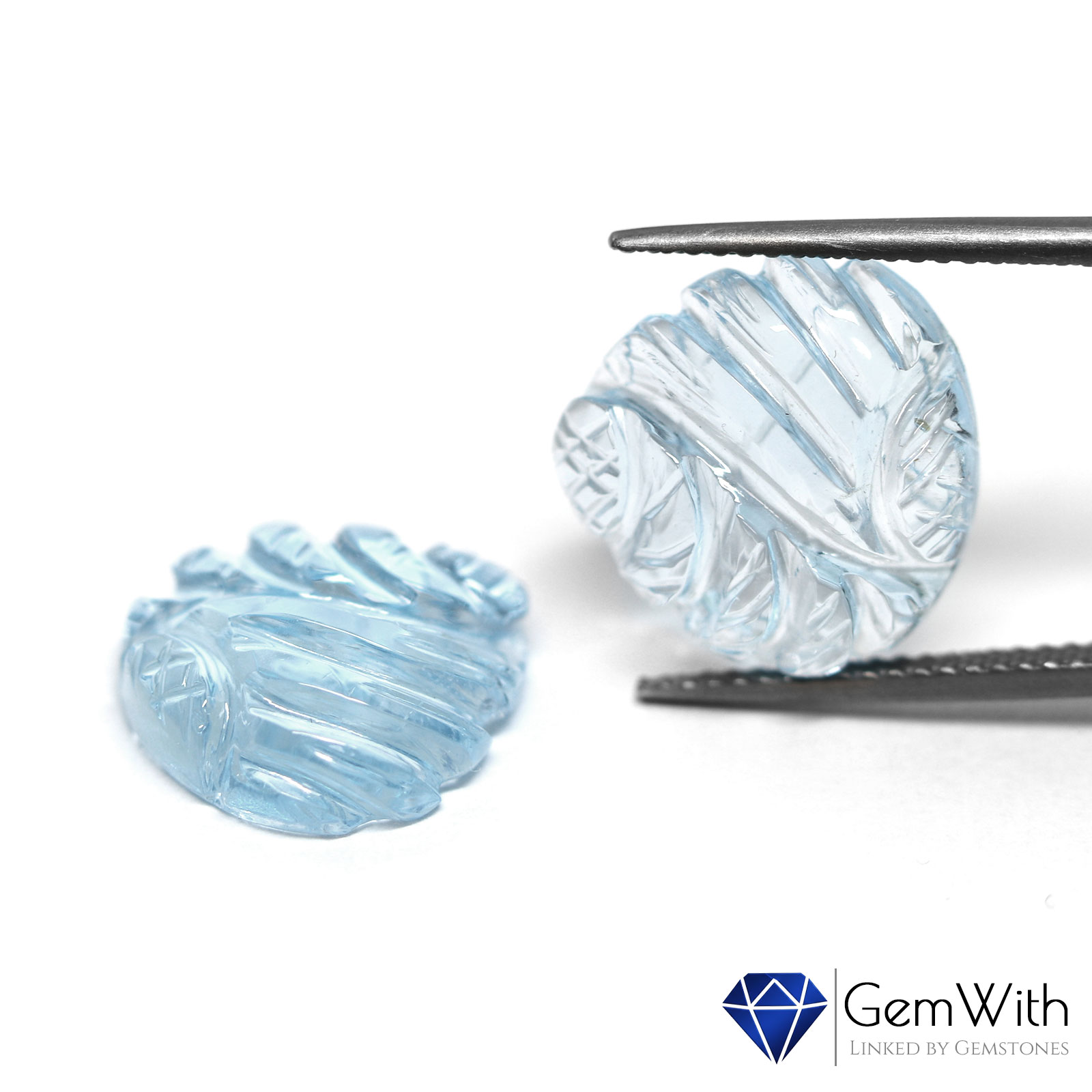 ブルートパーズカービングペア17.96CT | トパーズ | GemWith 宝石