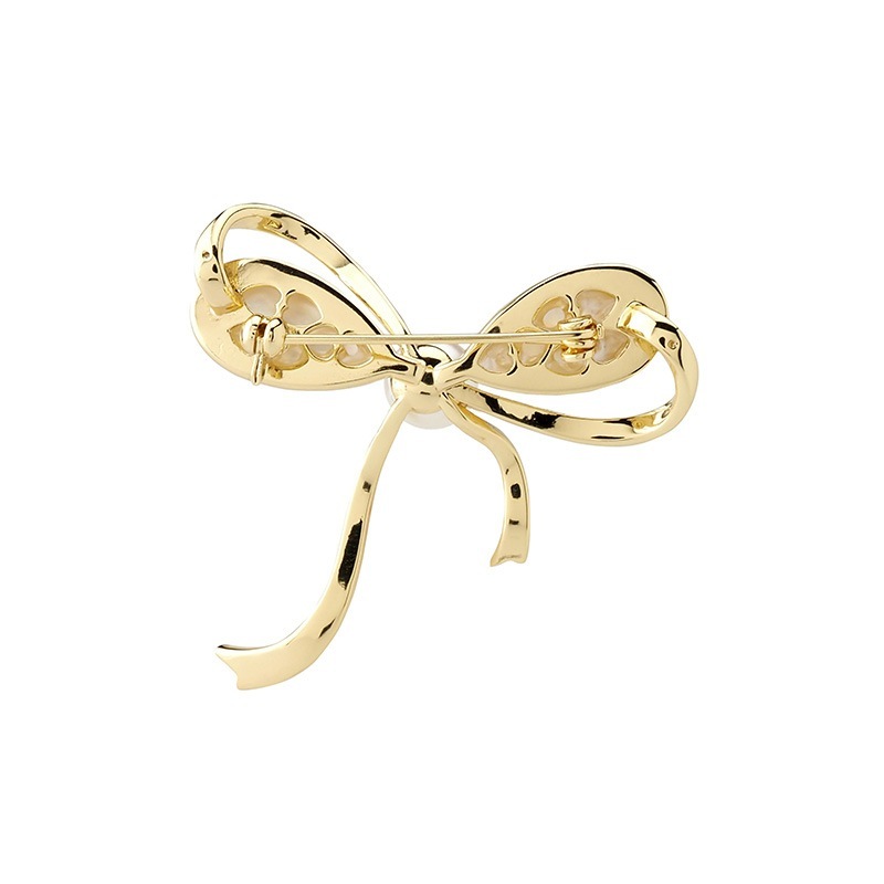 マザーオブパール　リボンモチーフブローチ ゴールドカラー
