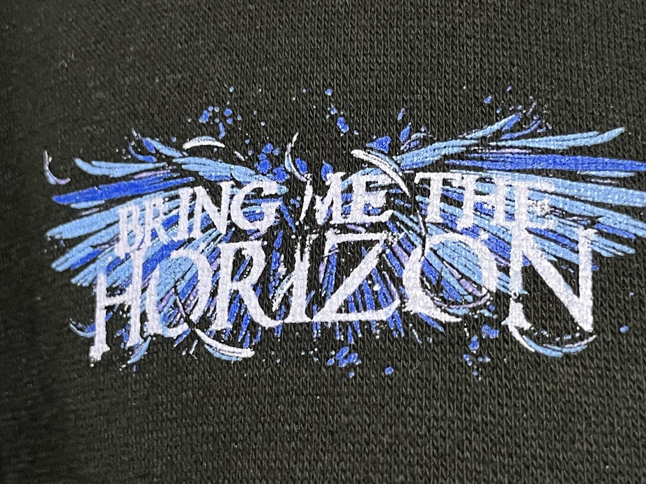�ں߸ˤ����BRING ME THE HORIZON (�֥�󥰡��ߡ��������ۥ饤����) Blue Crow Wings �֥֥롼���������������󥰥��� ���åס��ѡ����� M������