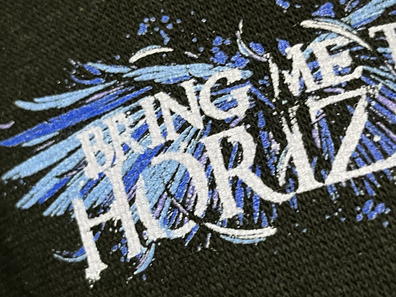 �ں߸ˤ����BRING ME THE HORIZON (�֥�󥰡��ߡ��������ۥ饤����) Blue Crow Wings �֥֥롼���������������󥰥��� ���åס��ѡ����� M������