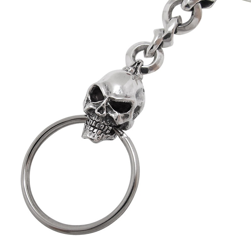 KARNIVALE WITH SKULL HOLDING KEYRING
