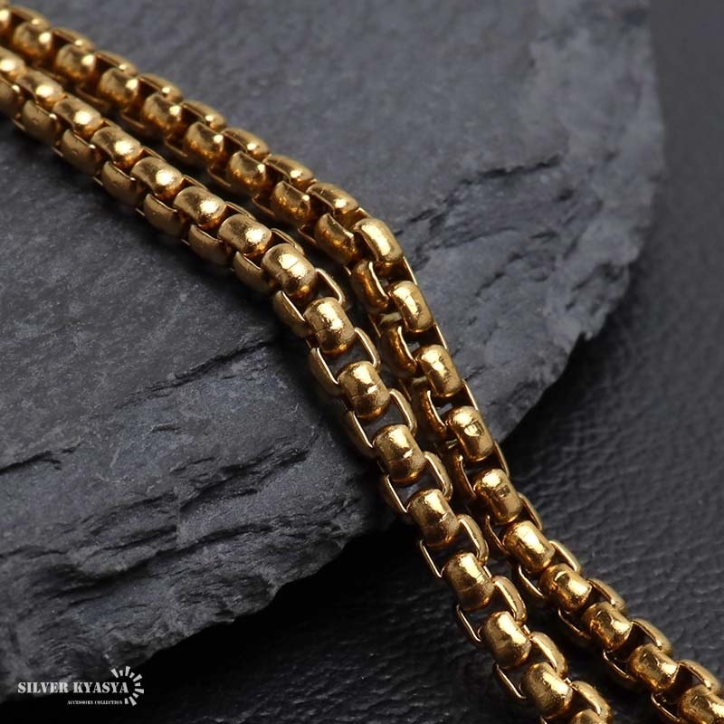 ステンレス 豪華なストーンが魅力的なクロスネックレス ゴールド