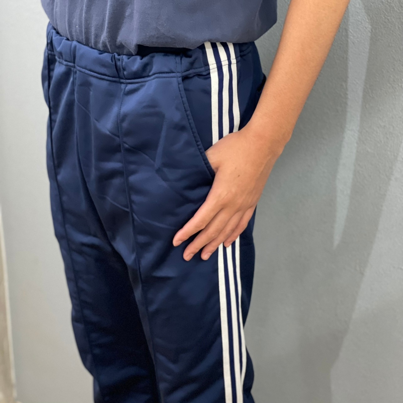 “adidas FLARE TRCK  PANTS“