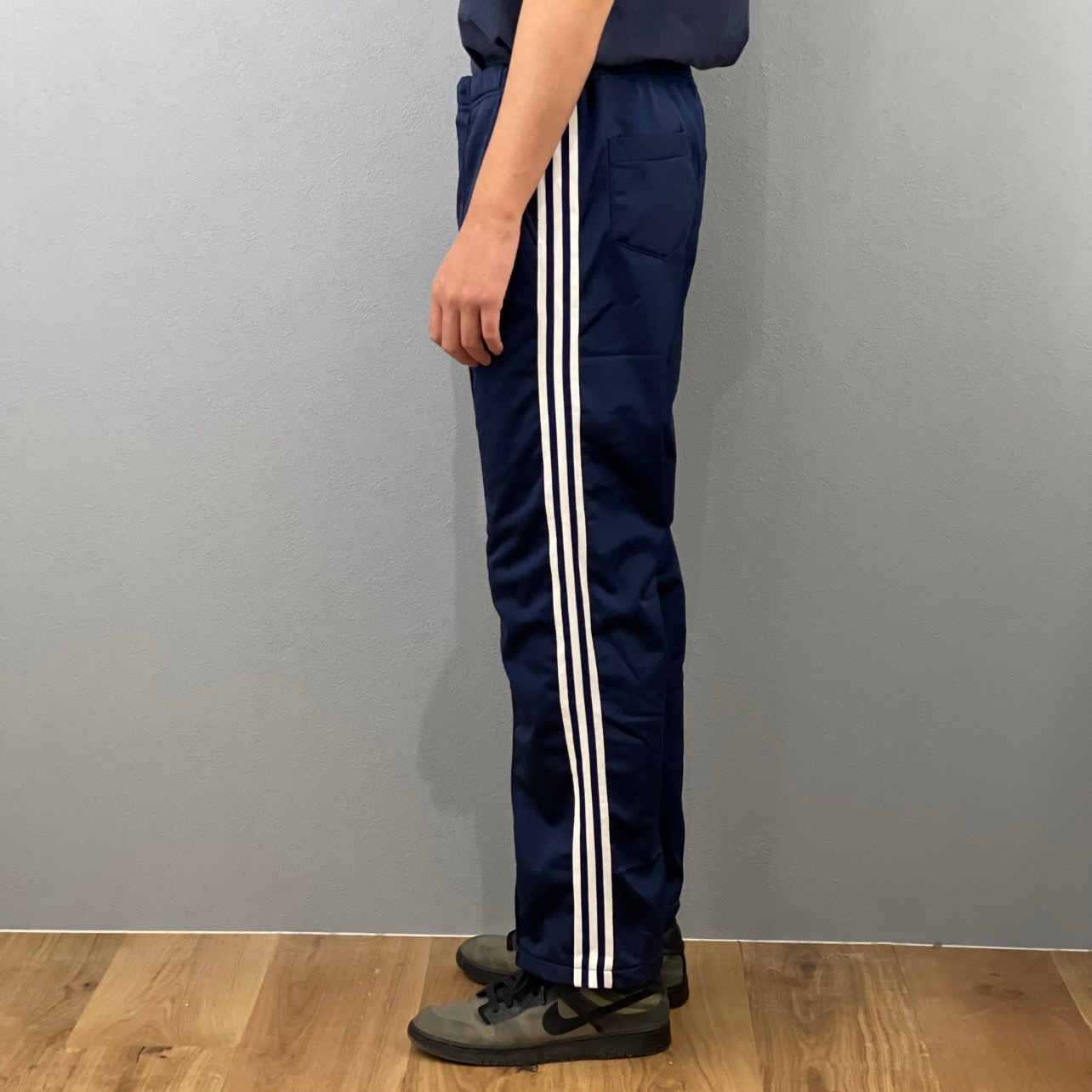 “adidas FLARE TRCK  PANTS“