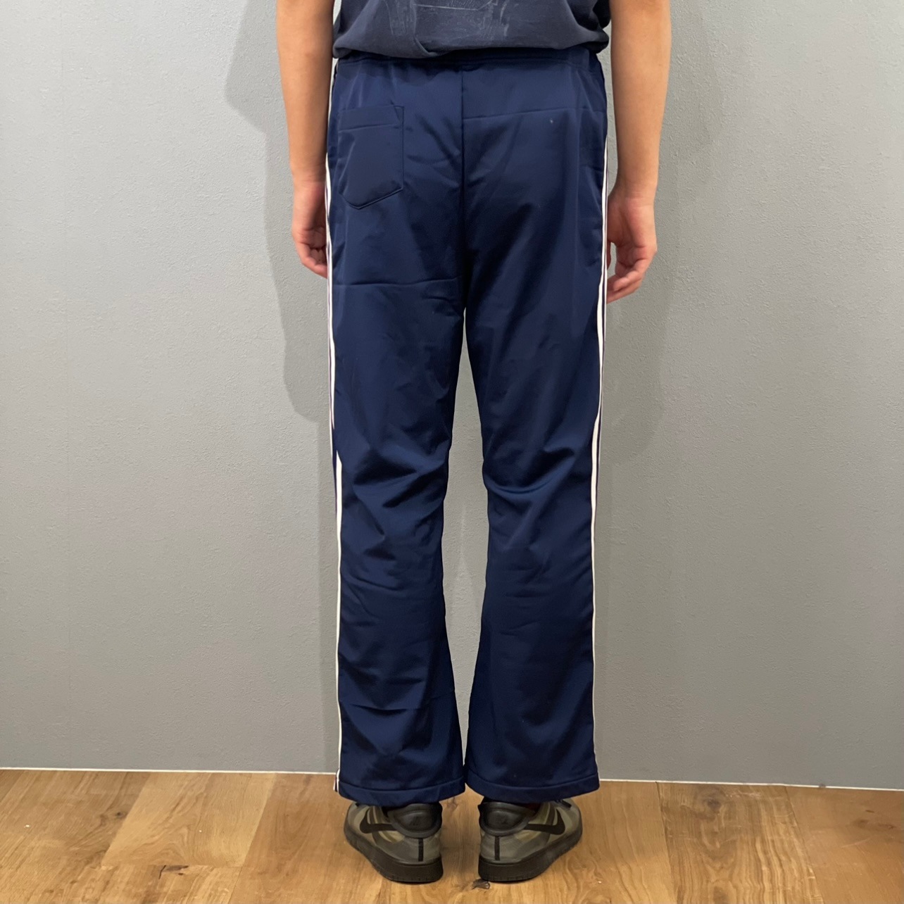 “adidas FLARE TRCK  PANTS“