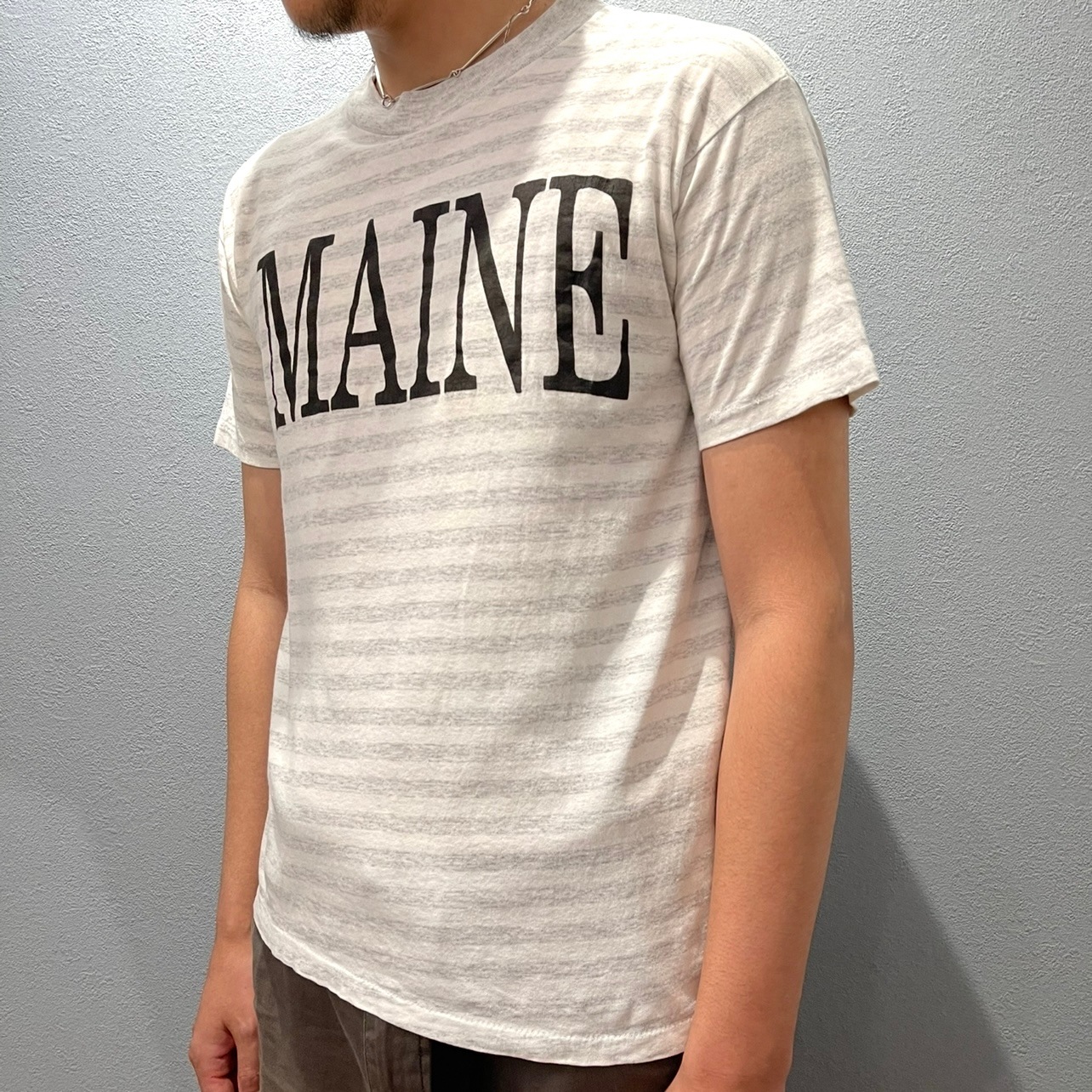 “BORDER PRINT T-SHIRT”