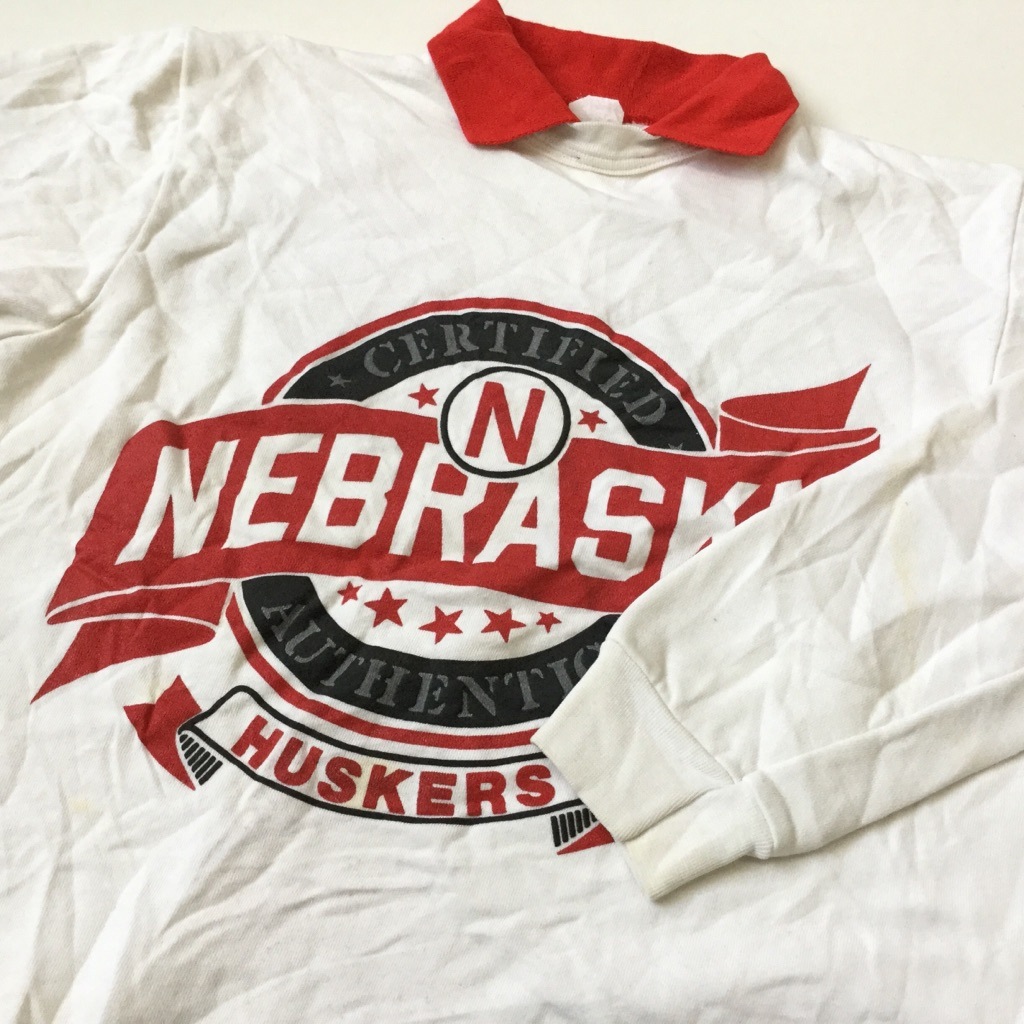 NEBRASKA HUSKERS �֥ͥ饹�� �ϥ������� ����ꥫľ͢�� �������å� �ȥ졼�ʡ� ����̵�� ��� L/42-44/�� ����ե� �եåȥܡ��� MADE IN USA NFL ���ݡ��� ���դ� ��ǥ����� ��˥��å��� ���岷 ����