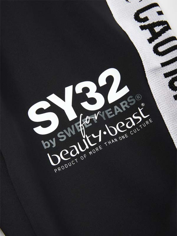 SY32xb:b COLLABORATION PANTS