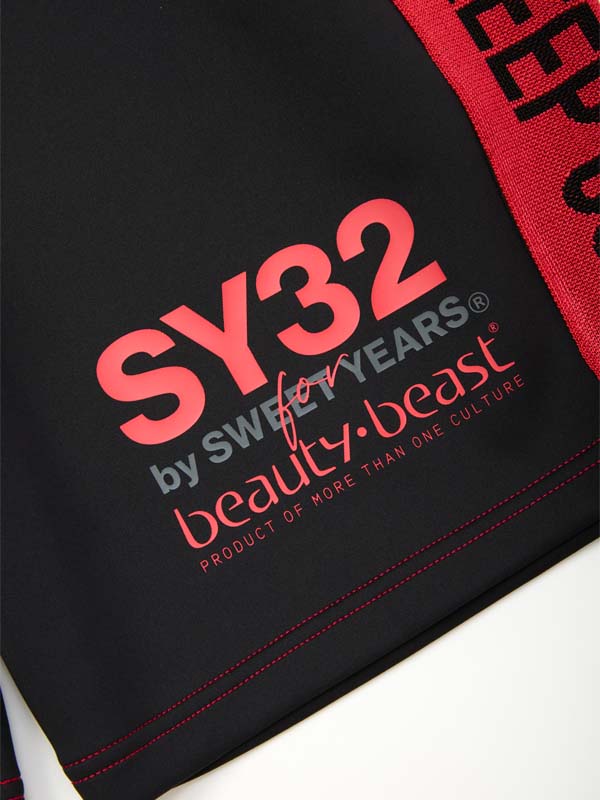 SY32xb:b COLLABORATION SHORT PANTS