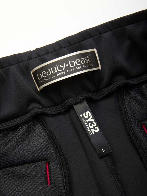 SY32xb:b COLLABORATION SHORT PANTS