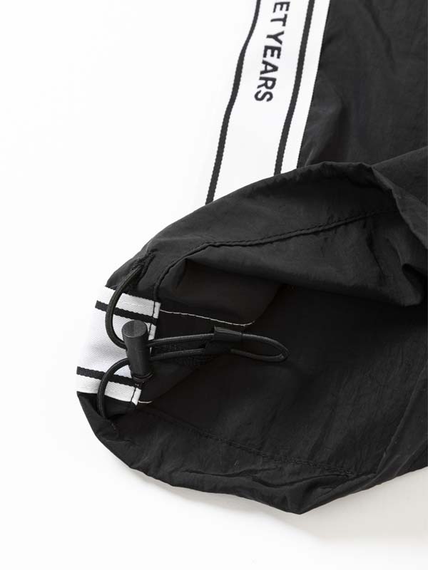 TAPE DESIGN NYLON PANTS