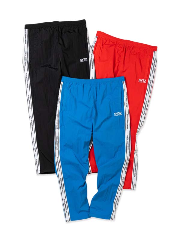 TAPE DESIGN NYLON PANTS