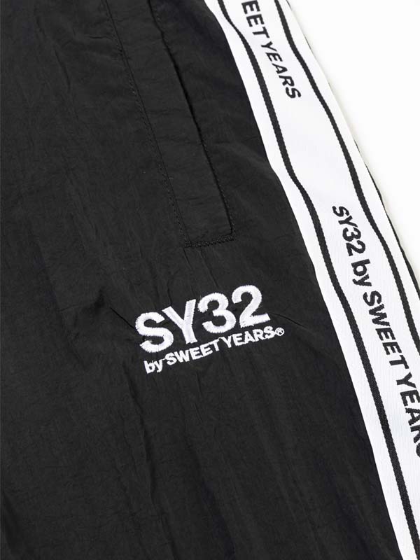 TAPE DESIGN NYLON PANTS