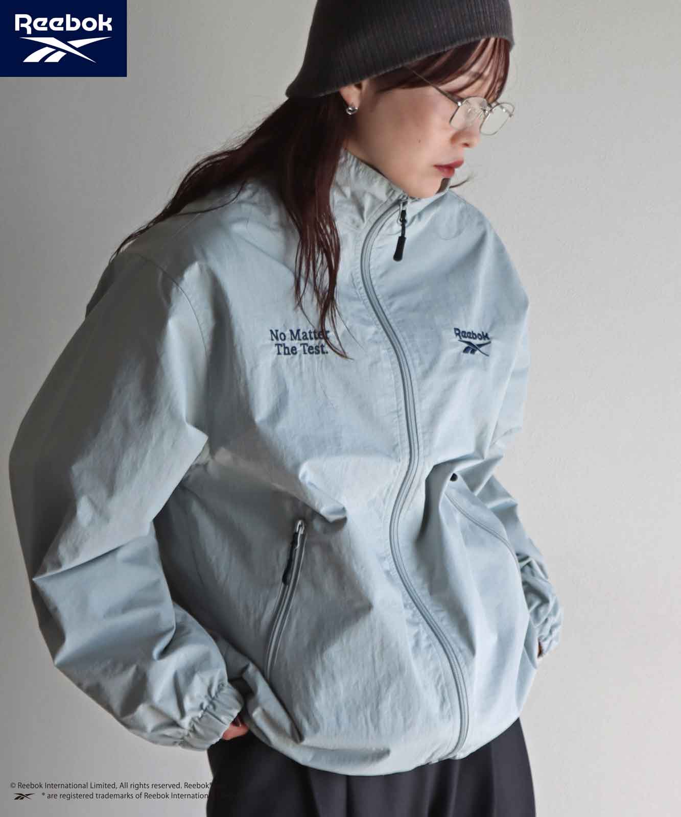 新品タグ付き　Reebok ジャケット Mサイズ ホワイト・グレー　ユニセックス 10%OFF】【Reebok/リーボック】 別注 スモールベクターナイロン