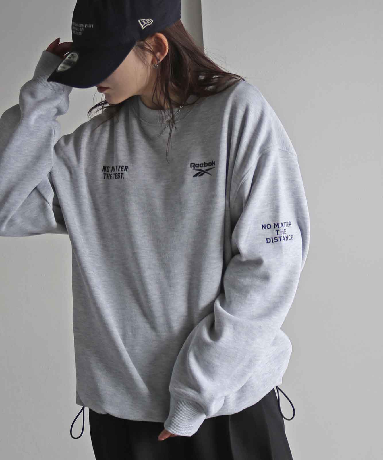 Reebok/リーボック】 別注 3ポイント刺繍裾ドロストクルーネック