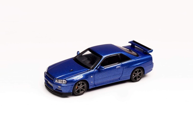 ★予約商品　MOTORHELIX　M63403　1/64　日産 スカイライン GT-R R34 V Spec II ベイサイドブルー