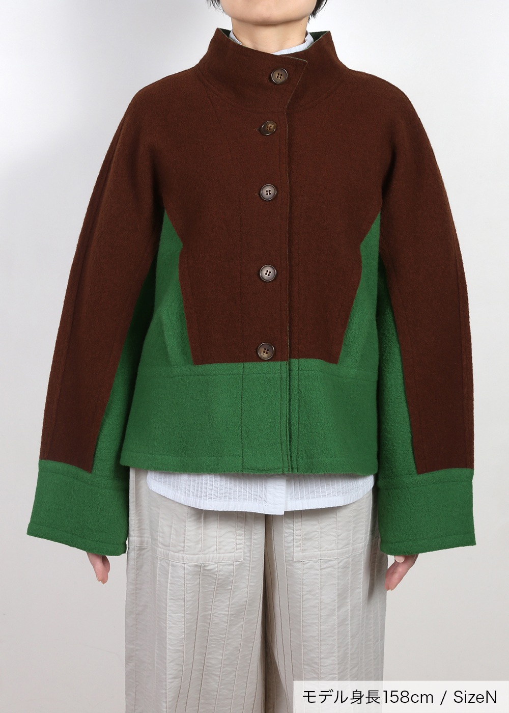 圧縮ニットハイネック裾切り替えジャケット