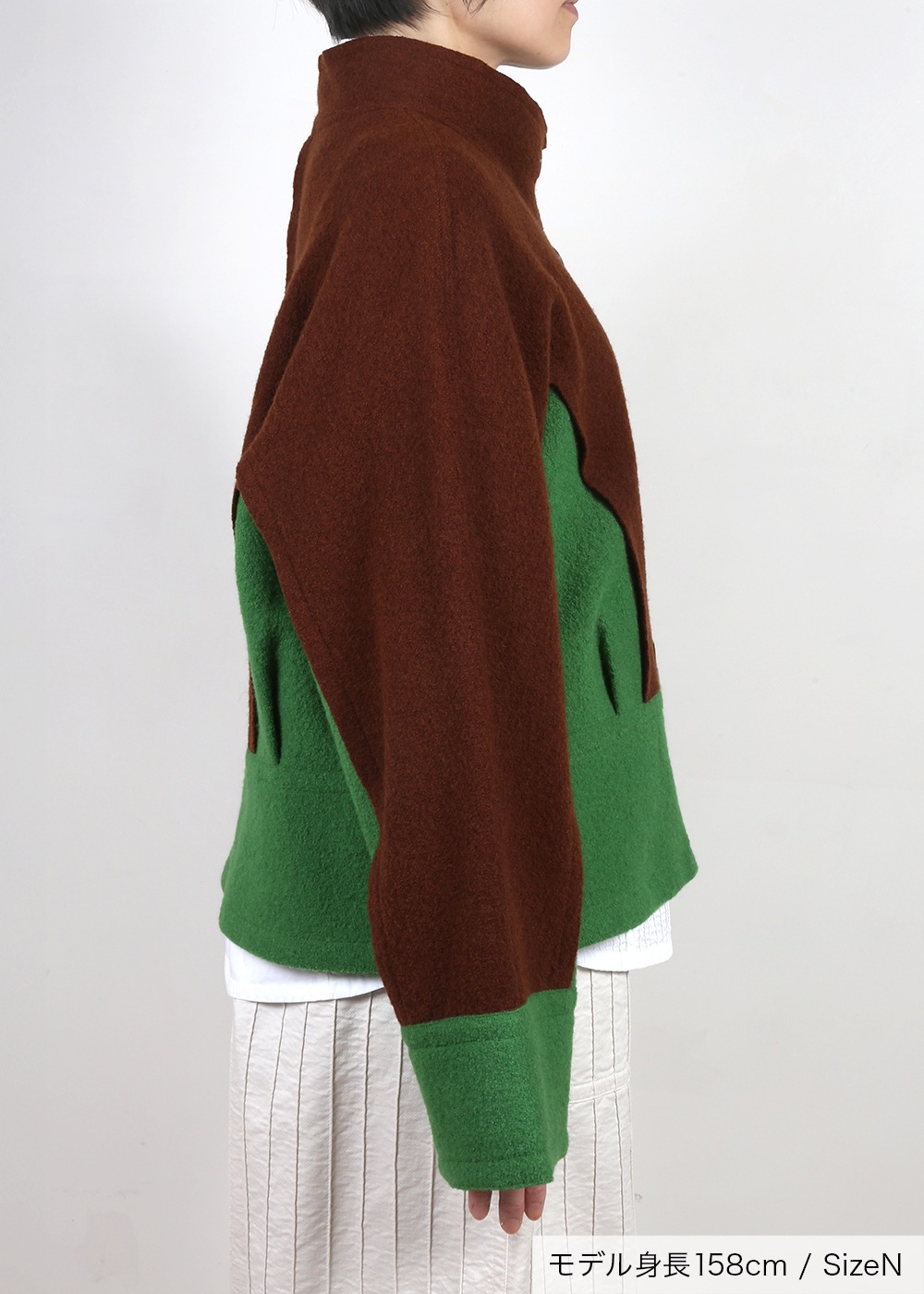 圧縮ニットハイネック裾切り替えジャケット